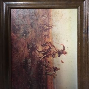 Charles Russell framed western prints.